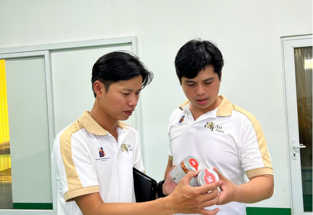 An Supply team reviewing private label cashew snack product quality